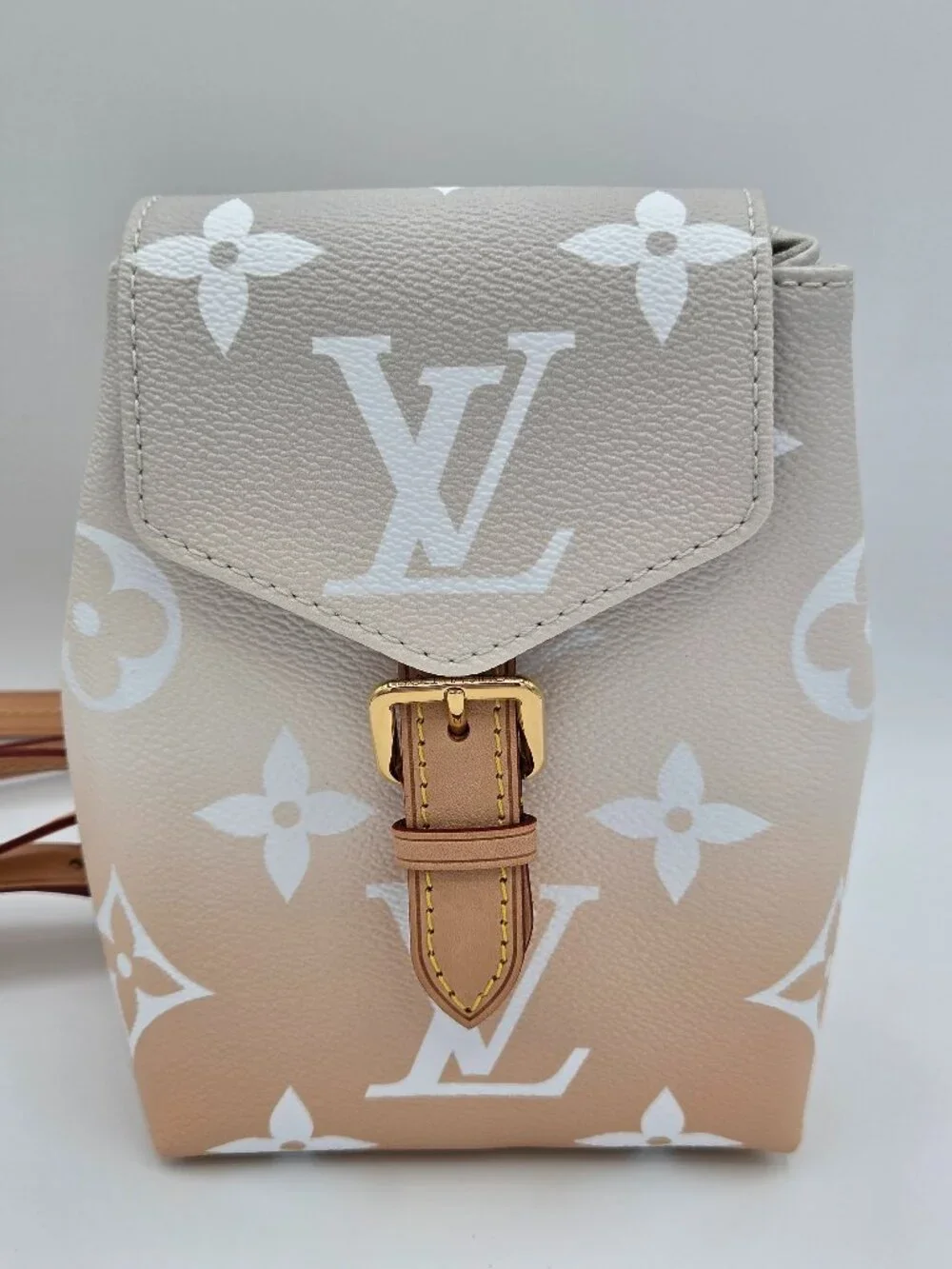 louis vuitton by the pool mini backpack Brume Monogram Coated Canvas GHW while the zipped back pocket is ideal for cards. Vuitton Mini Backpack Louis Vuitton